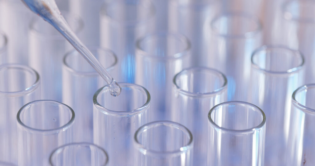 Test tubes with liquid drops